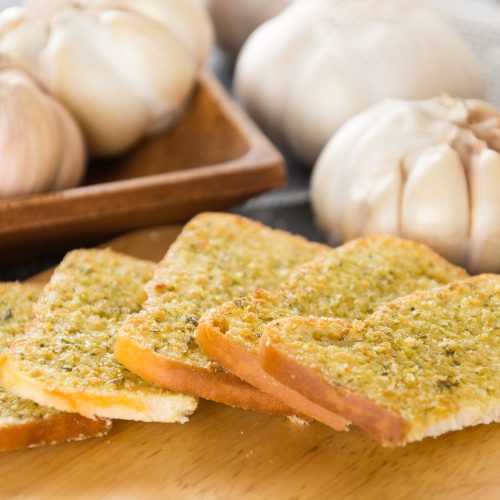crispy bread garlic on wood background